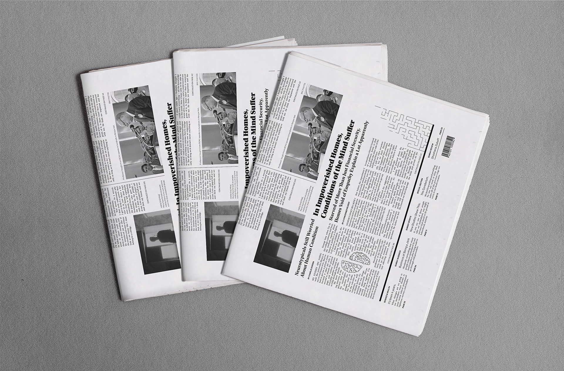 The lower half of the opening page is featured in overlapping, folded-in-half editions of the newspaper.